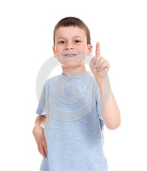 Boy points finger up