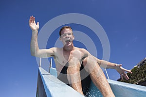 Boy Pool Slide Fun