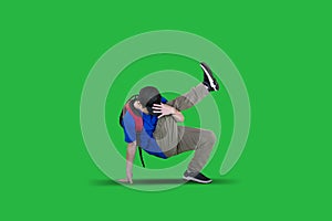 Boy posing break-dance in the studio