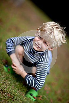 Boy posing at funny angle