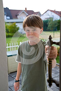 Boy Pre-teen Confident Open Door Handle