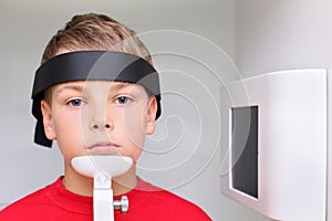 Boy prepared to jaw x-ray image photo