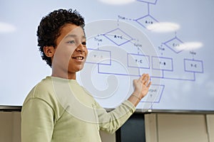 Boy Presenting in Coding Class