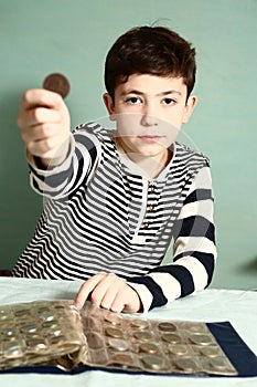 Boy preteen numismatic collector show coin photo