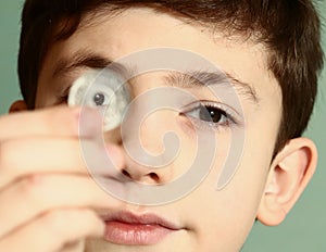 Boy preteen numismatic collector show coin photo