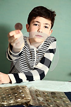 Boy preteen numismatic collector photo