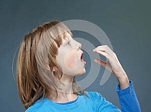 Boy Pretending to be Eating.