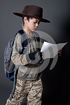 Boy pretending to be an explorer