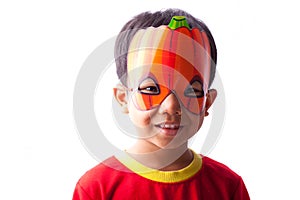 Boy with pumpkin mask