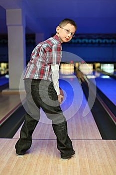 Boy qualify to throw ball for bowling photo