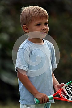 Boy with a racquet