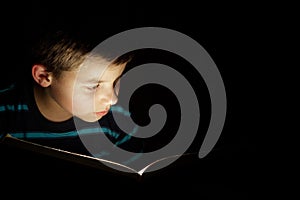 Boy reading bedtime story