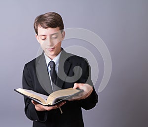 Boy Reading Bible