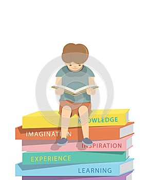 Boy reading a book on a pile of books White background