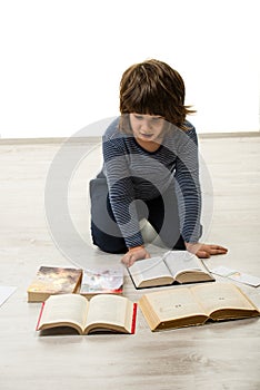Boy reading books