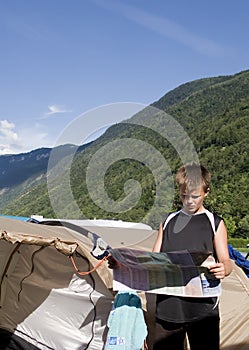 Boy reading map