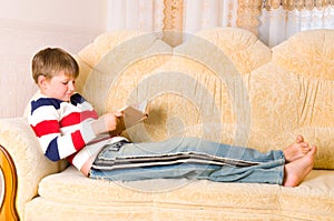 Boy reads book