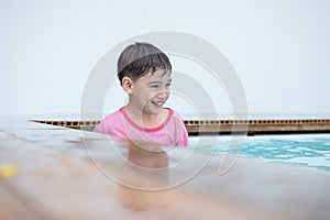 Boy ready in the corner to swim out