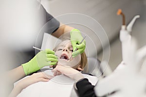 A boy at the reception at the dentist in the clinic