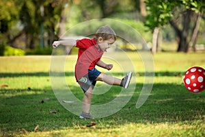 Boy with Red Ball