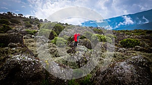 Boy in red jacket adventure extreme vacation