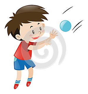 Boy in red shirt catching blue ball