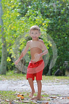 Boy in red shorts