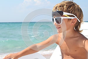 Boy relaxing on beach