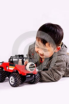 Boy and remote control car