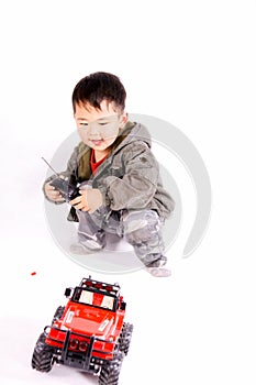 Boy and remote control car