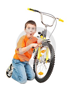 Boy repair bicycle