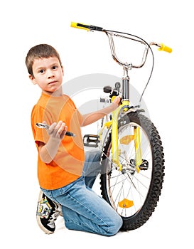 Boy repair bicycle