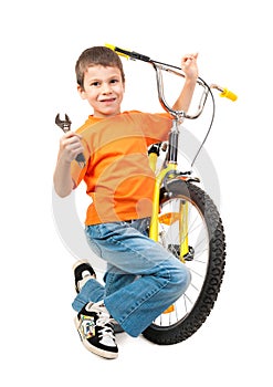 Boy repair bicycle