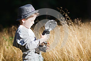 Boy with retro camera