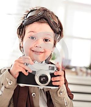 Boy with retro camera