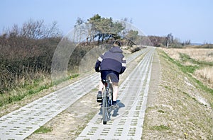 Boy riding a bike.