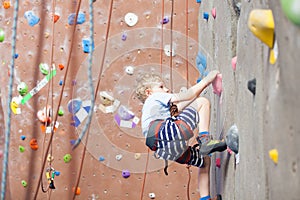 Boy rock climbing