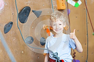 Boy rock climbing