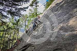 Boy Rock Climbing Outdoors