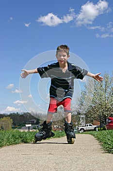 Boy Roller-Blading photo