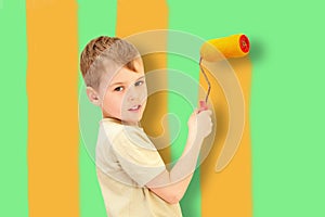 A boy with a roller draws bars, collage photo