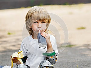 Boy roller skates break
