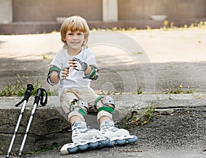 Boy roller skates