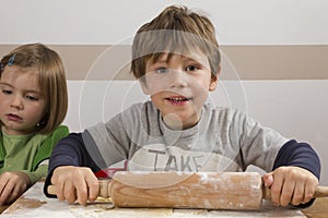 Boy with a rolling pin