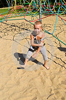 Boy running along the sand