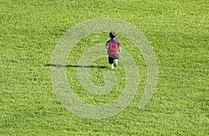 Boy-Running-Grass