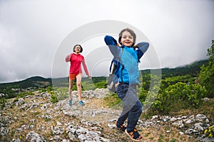 The boy runs away from his mother