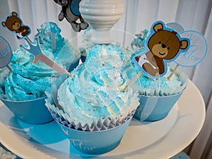 The boy`s birthday, blue, Birthday Boy Blue Party with Candy Presents and Cupcakes