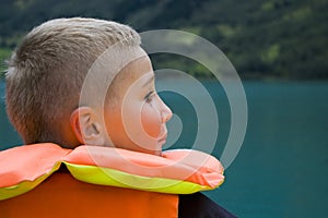 Boy in safety jacket.