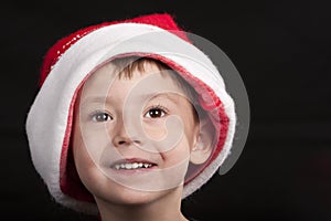 Boy in Santa Claus hat